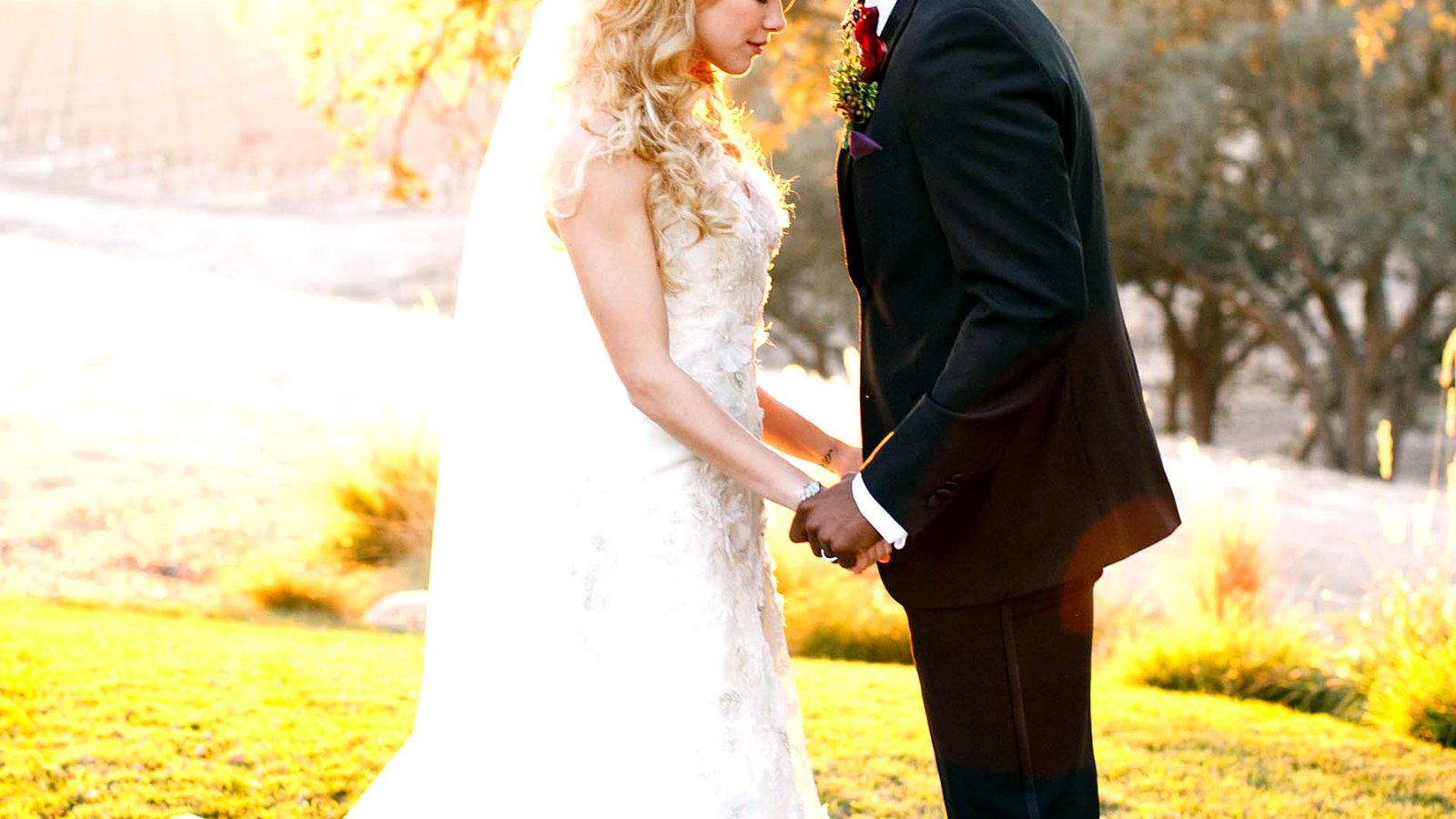 Allison Holker and Twitch Boss pose for wedding pictures