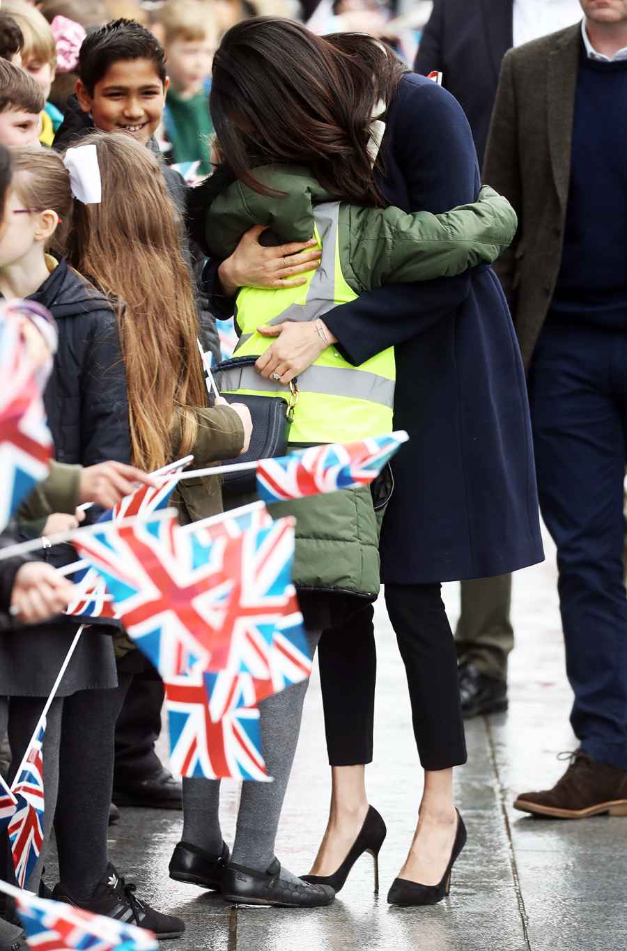 Prince Harry and Meghan Markle Hug Kids at Royal Engagement
