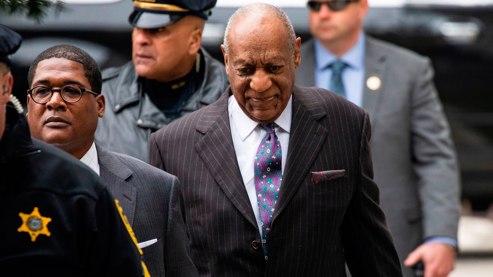 Comedian Bill Cosby arrives for the first day of his second trial