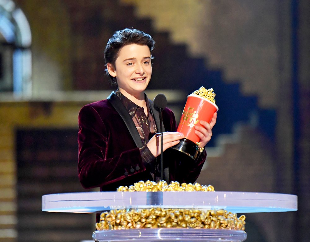 Noah Schnapp accepts award onstage at the 2018 MTV Movie And TV Awards at Barker Hangar on June 16, 2018 in Santa Monica, California.