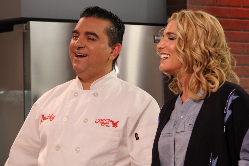 Buddy laughs with judge (and wife) Lisa Valastro.