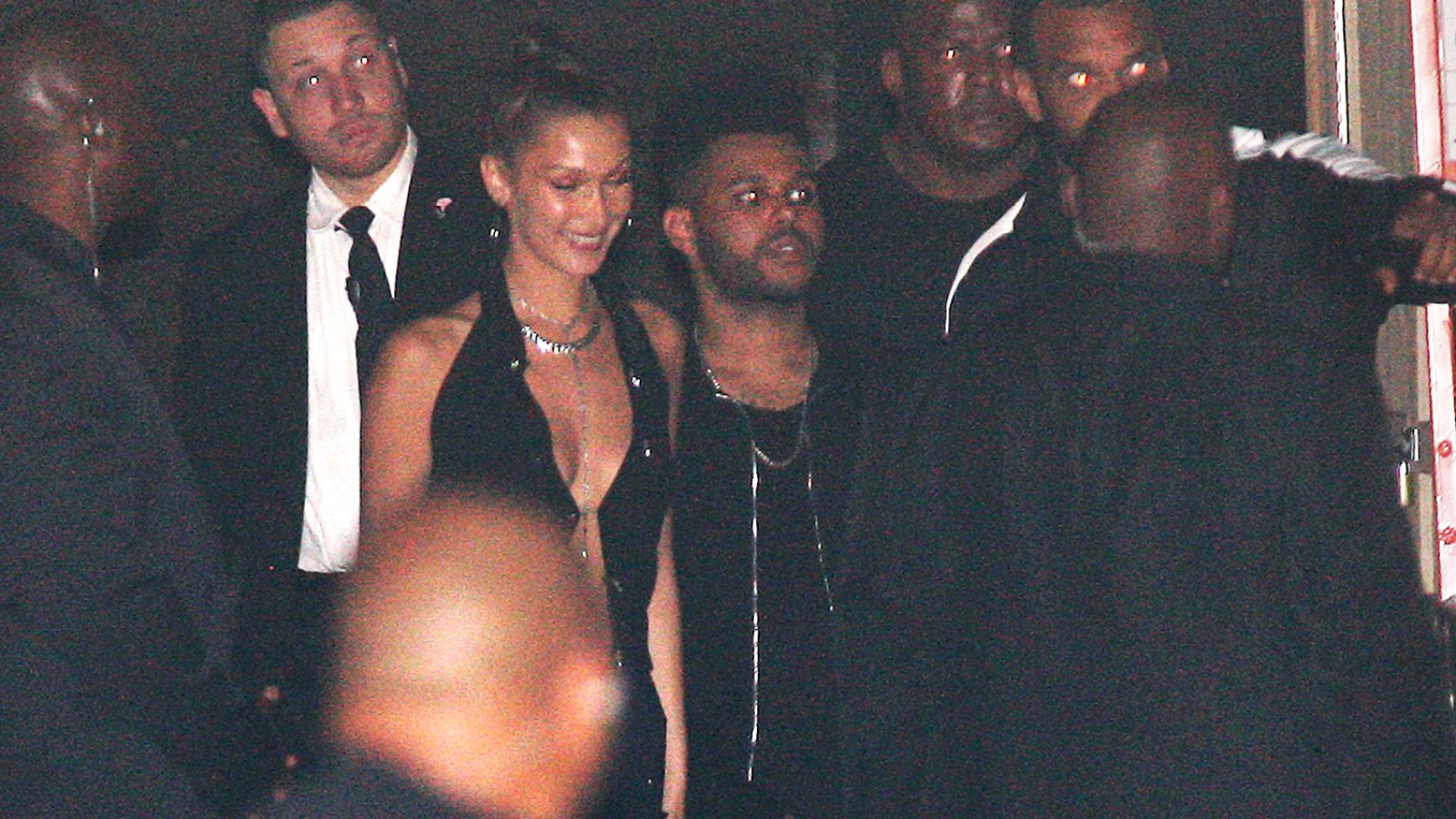 Bella Hadid and The Weeknd are spotted leaving from the back of the Delilah club after celebrating Kylie Jenner's 21st birthday party in West Hollywood on August 10, 2018.