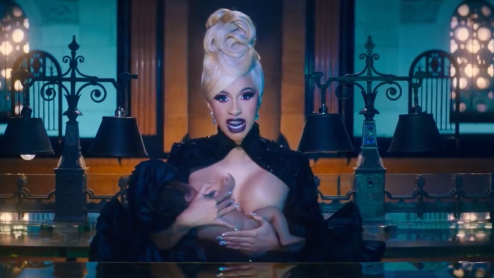 Cardi B Breastfeeds, Plays Piano Naked in New 'Money' Video