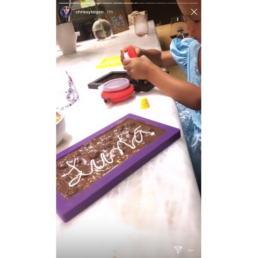 Chrissy Teigen, John Legend Make Chocolates With Daughter Luna