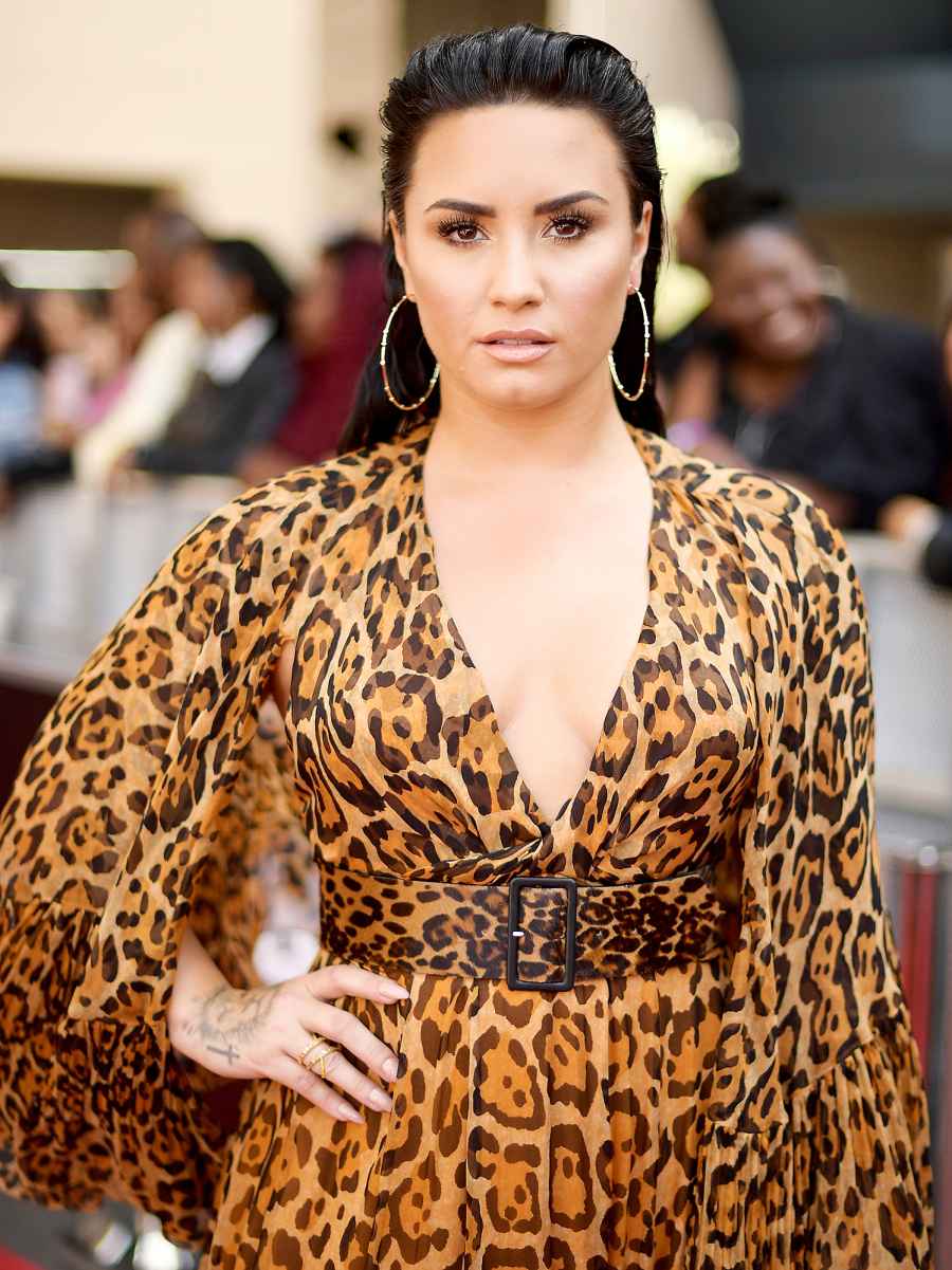Demi Lovato attends the 2018 Billboard Music Awards Taylor Swift vs Scooter Braun