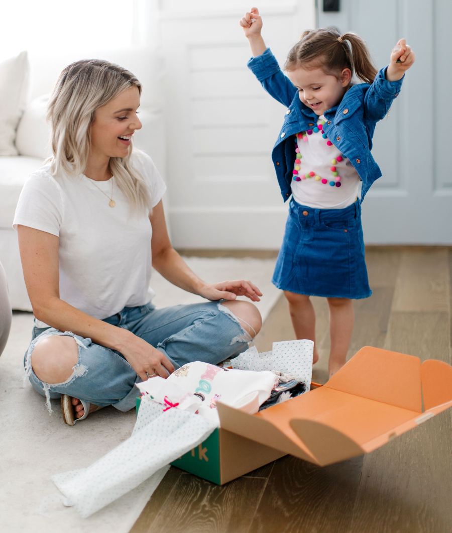 Ali Fedotowsky kidpik Molly Opening Box Jubilation Happy Arms In Air