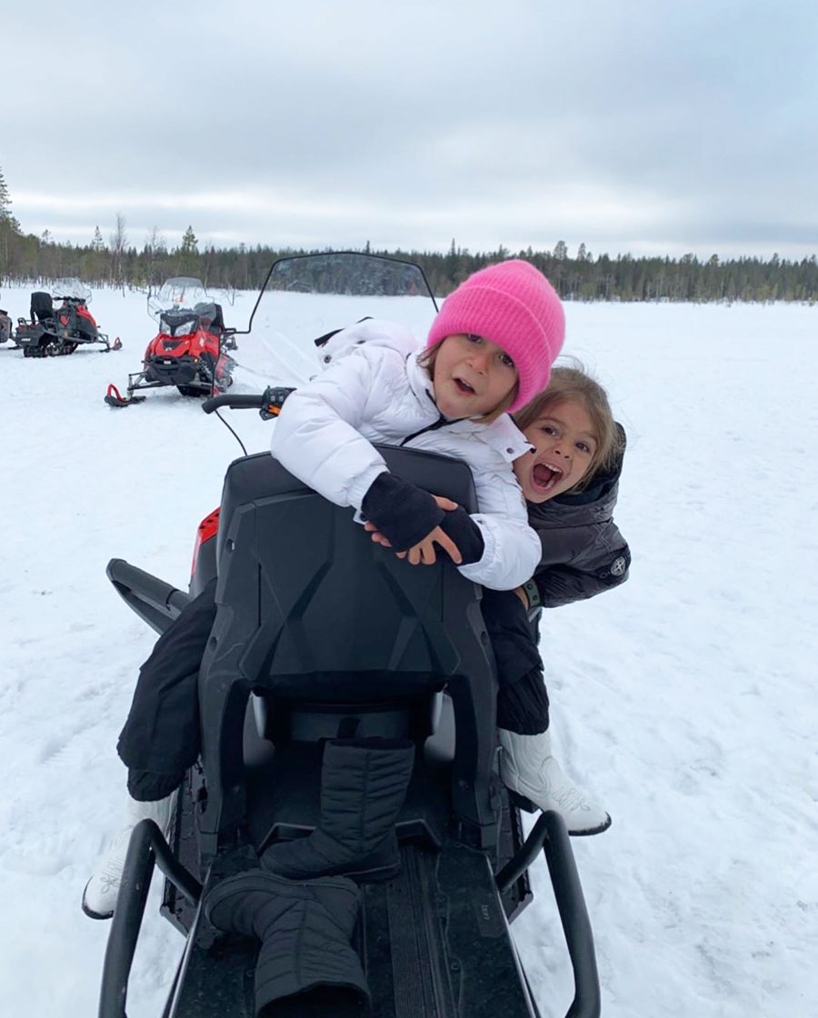 Penelope Disick Photo Album Making Faces with Reign Disick on Snowmobile in Finland