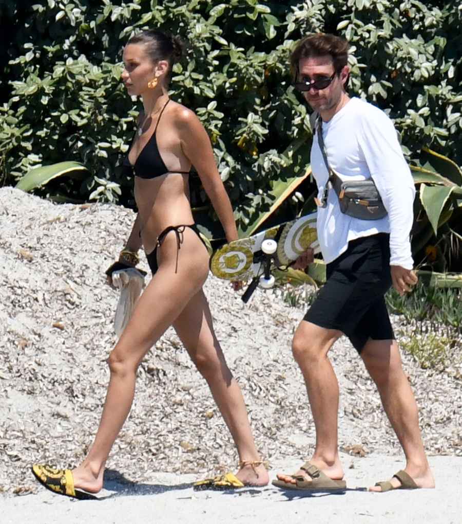 Bella Hadid Stuns in Tiny Black Bikini Shooting on a Beach in Corsica