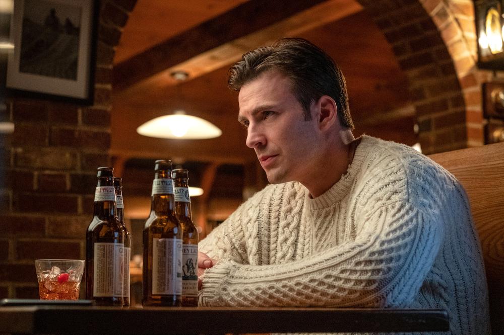 Chris Evans Cuddles a Puppy in Iconic 'Knives Out' Sweater That Went Viral