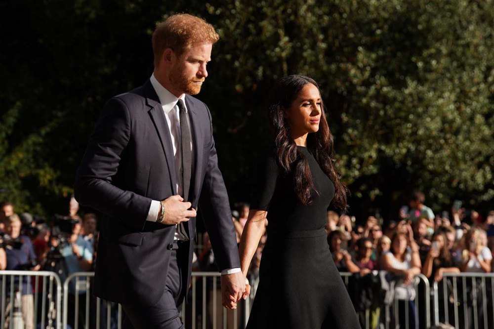 Meghan Markle and Prince Harry Join Royal Family to Receive Queen's Coffin at Buckingham Palace