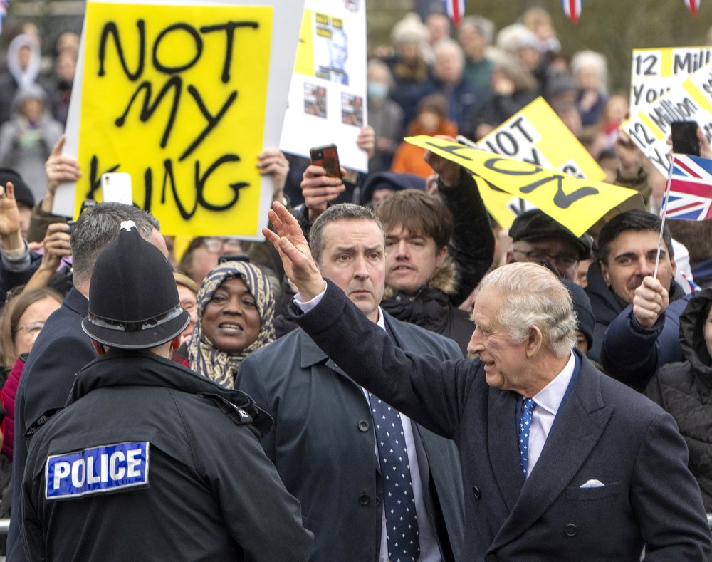 King Charles III Ignores Protestors With 'Not My King' Signs Outside Royal Engagement in London
