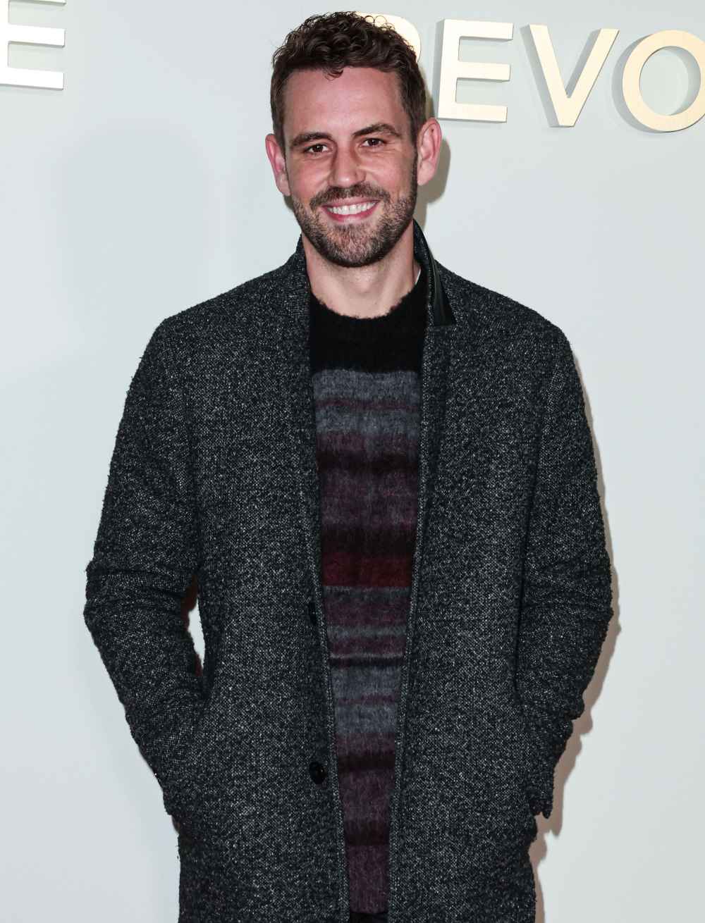 Nick Viall Responds to Kaitlyn Bristowe Alleging ‘Bachelorette’ Producers ‘Sexualized’ Him grey coat