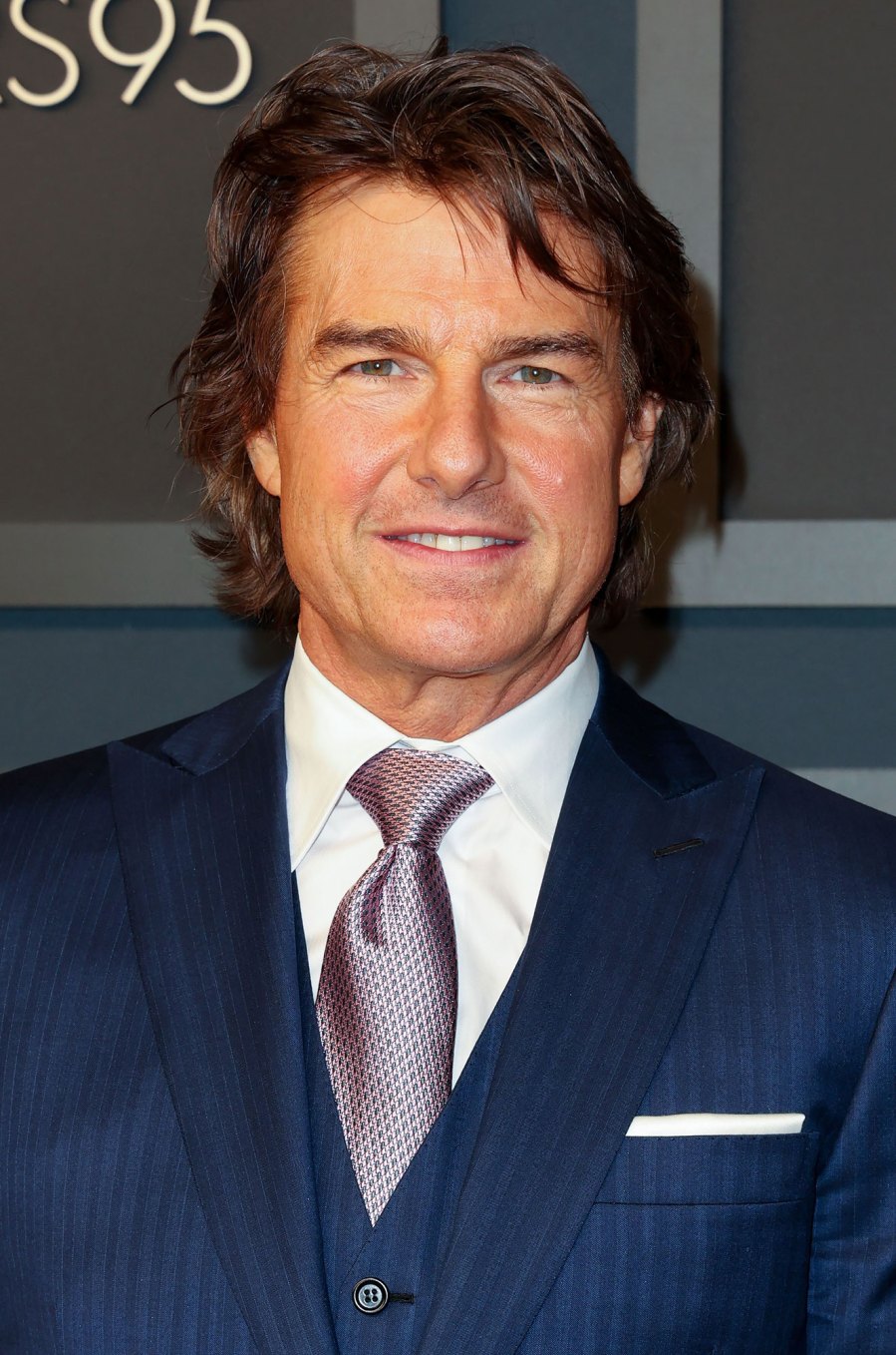 Tom Cruise Shows Off Long Hair lavender tie