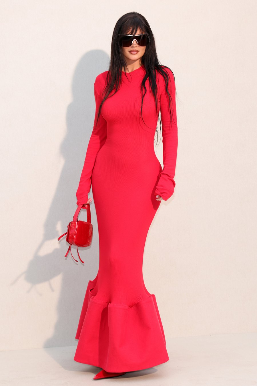 Kylie Jenner Red Dress Large Black Sunglasses at Acne Studios Paris Fashion Week 2023