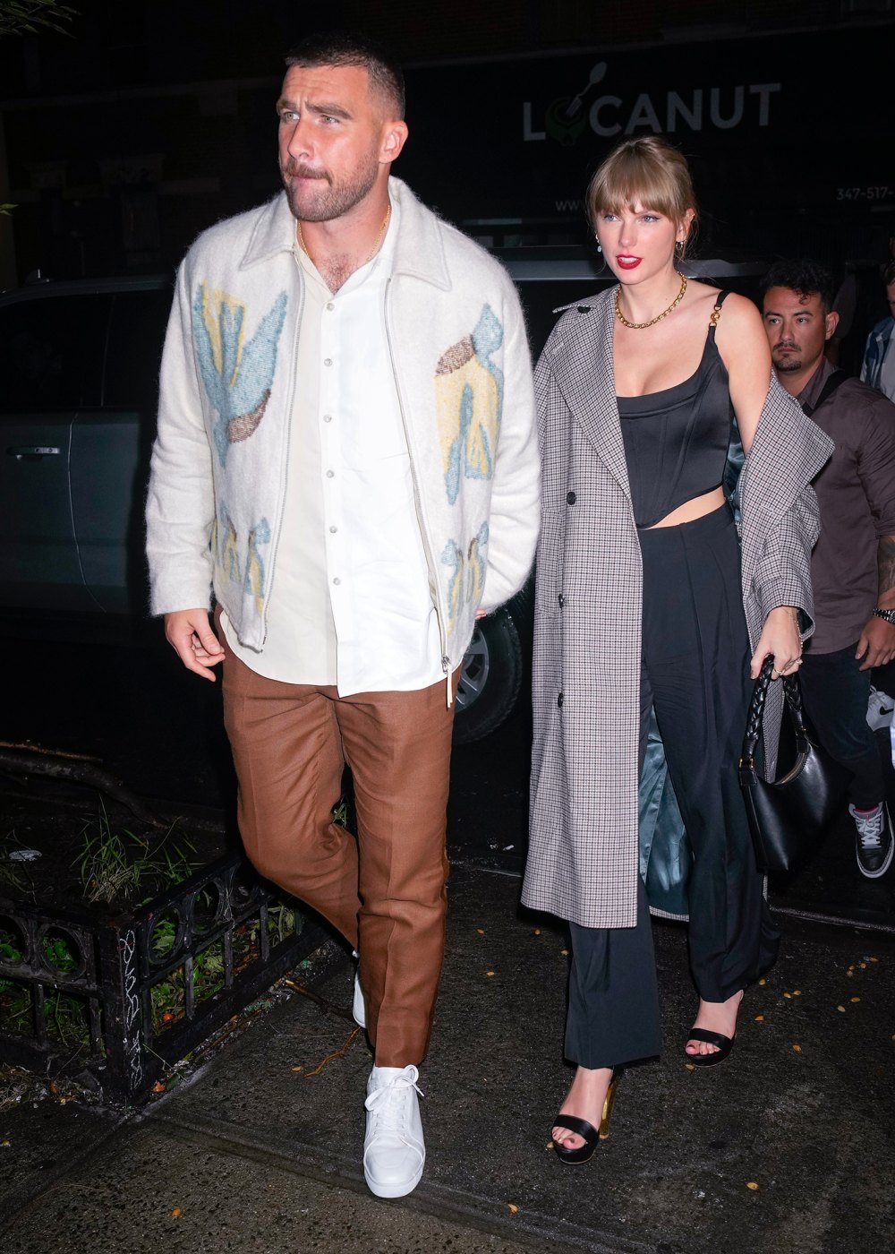 Taylor Swift and Travis Kelce Hold Hands After Surprise ‘Saturday Night Live’ Cameos