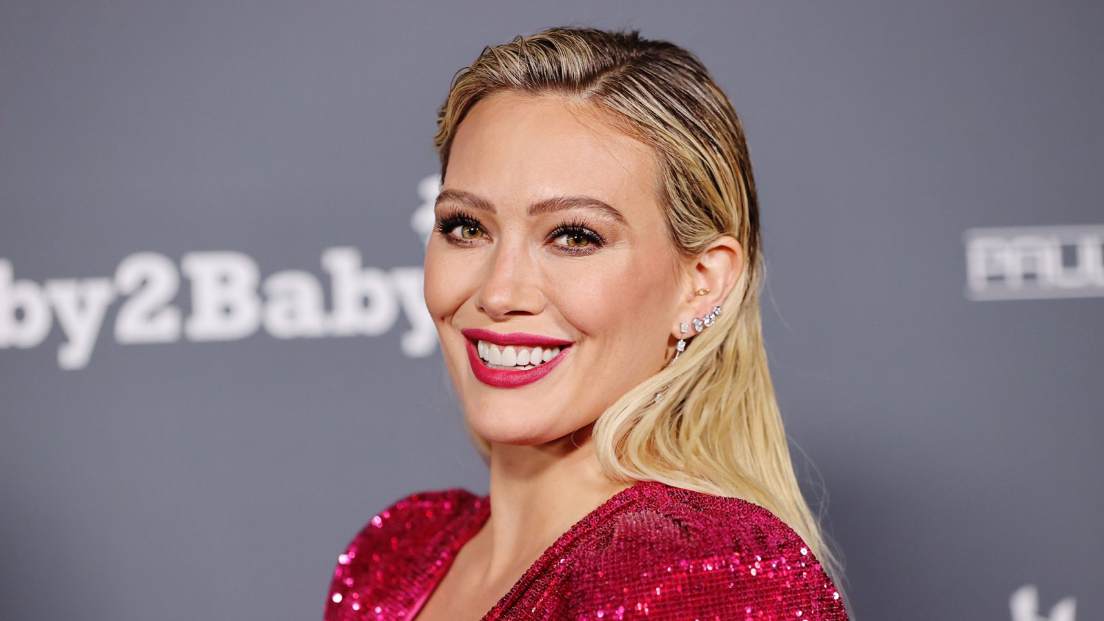 Pregnant Hilary Duff Jokes She Has Been ‘Trying to Hide’ Her Baby Bump ‘For a Minute’