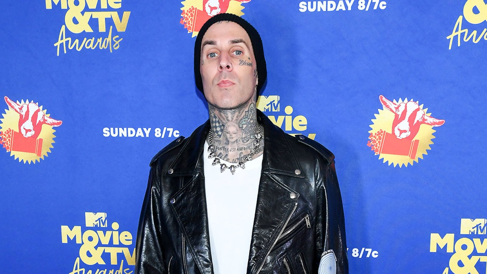 Travis Barker Faces Fan Backlash for T-Shirt Alluding to Sean Penn Alleged Abuse of Ex Madonna