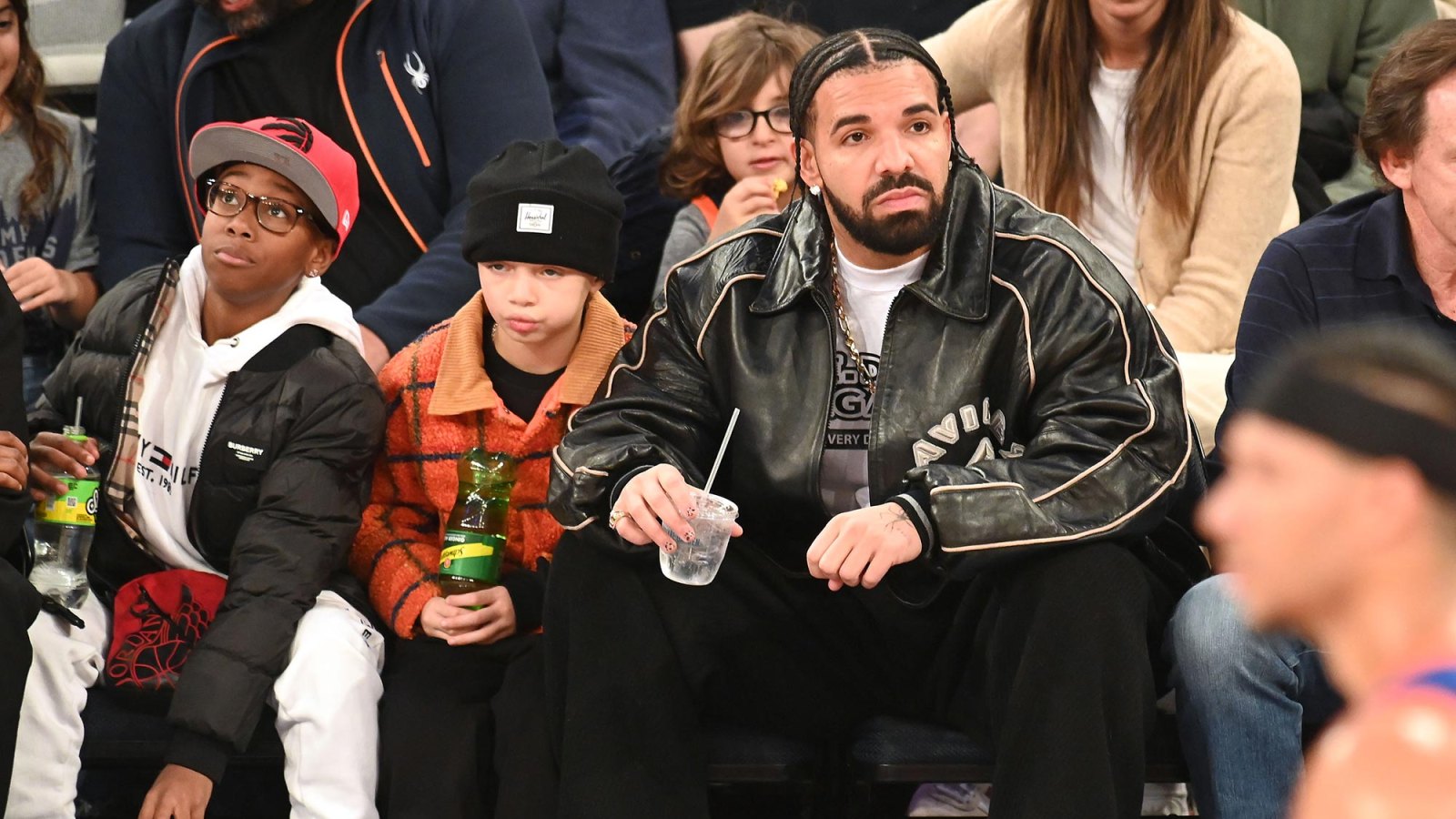 Drake and Son Adonis Sit Courtside at New York Knicks Game