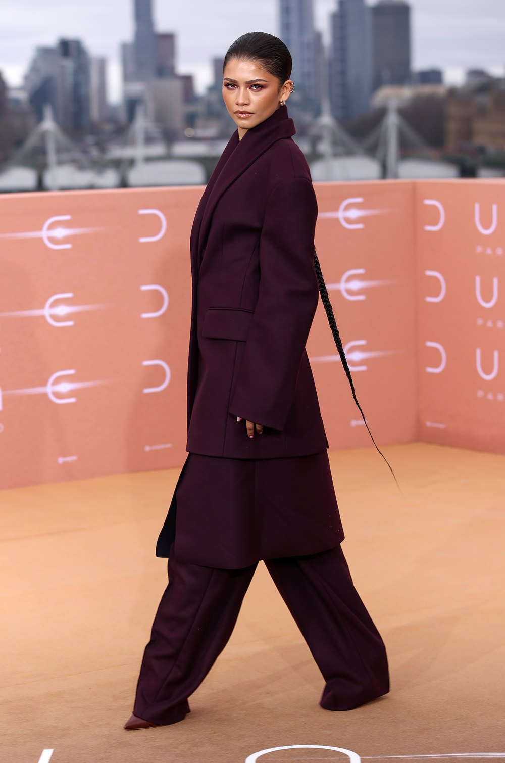 Timothee Chalamet and Zendaya Coordinate in Maroon Looks While Promoting Dune Part Two