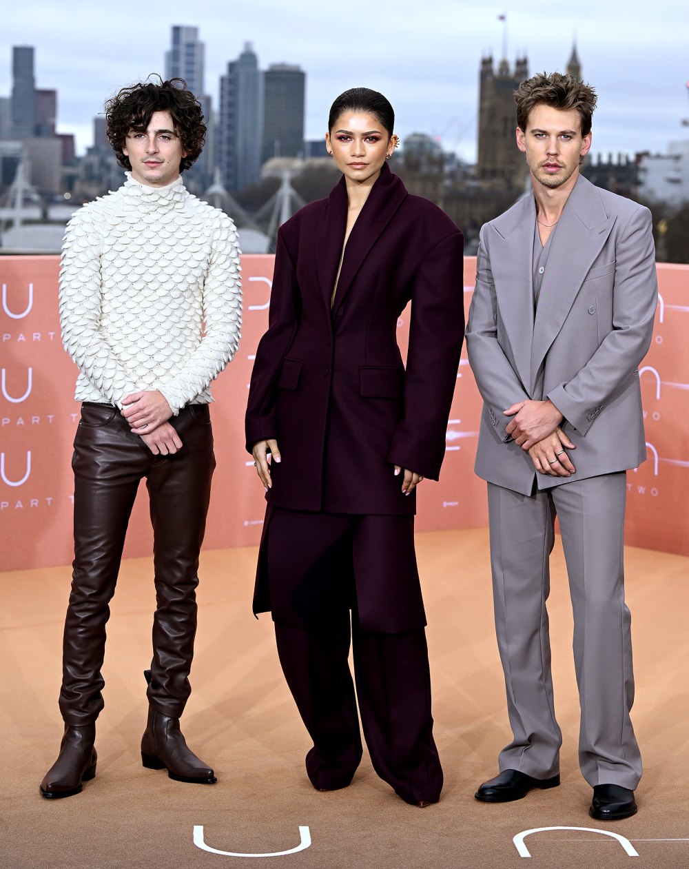 Timothee Chalamet and Zendaya Coordinate in Maroon Looks While Promoting Dune Part Two