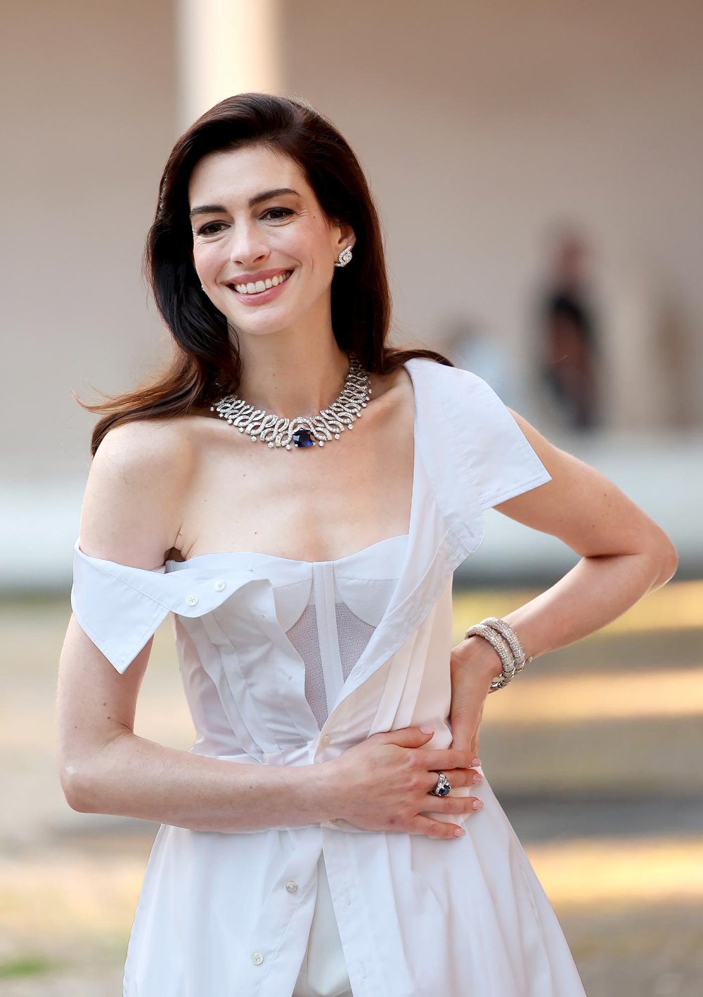 Anne Hathaway Glams Up a Gap Shirt Dress — Inspired by Audrey Hepburn — With Bulgari Jewelry