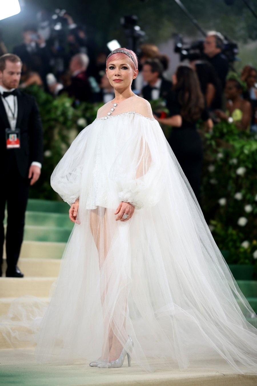 Michelle Williams Debuts Bold Pink Pixie Cut at the 2024 Met Gala