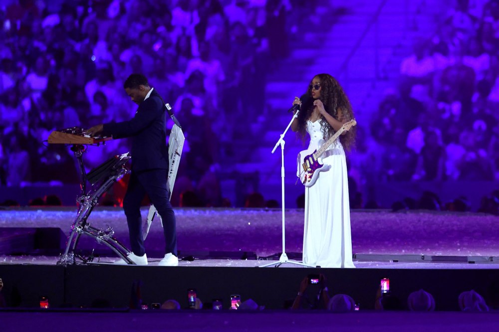 H.E.R. plays at Olympics closing ceremony.