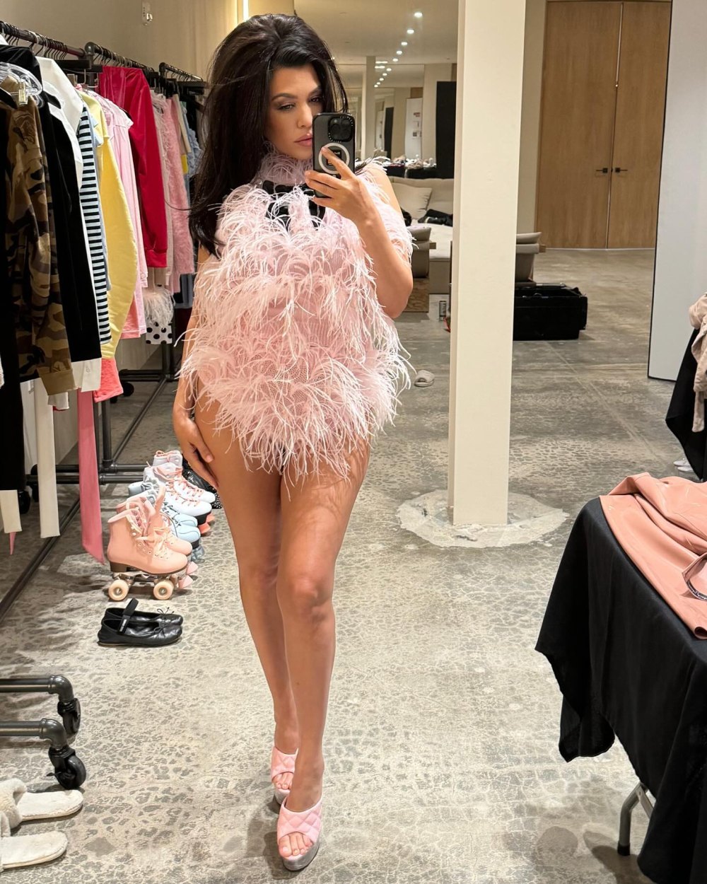 Kourtney Kardashian Delivers Drama in Feathered Pink Bodysuit