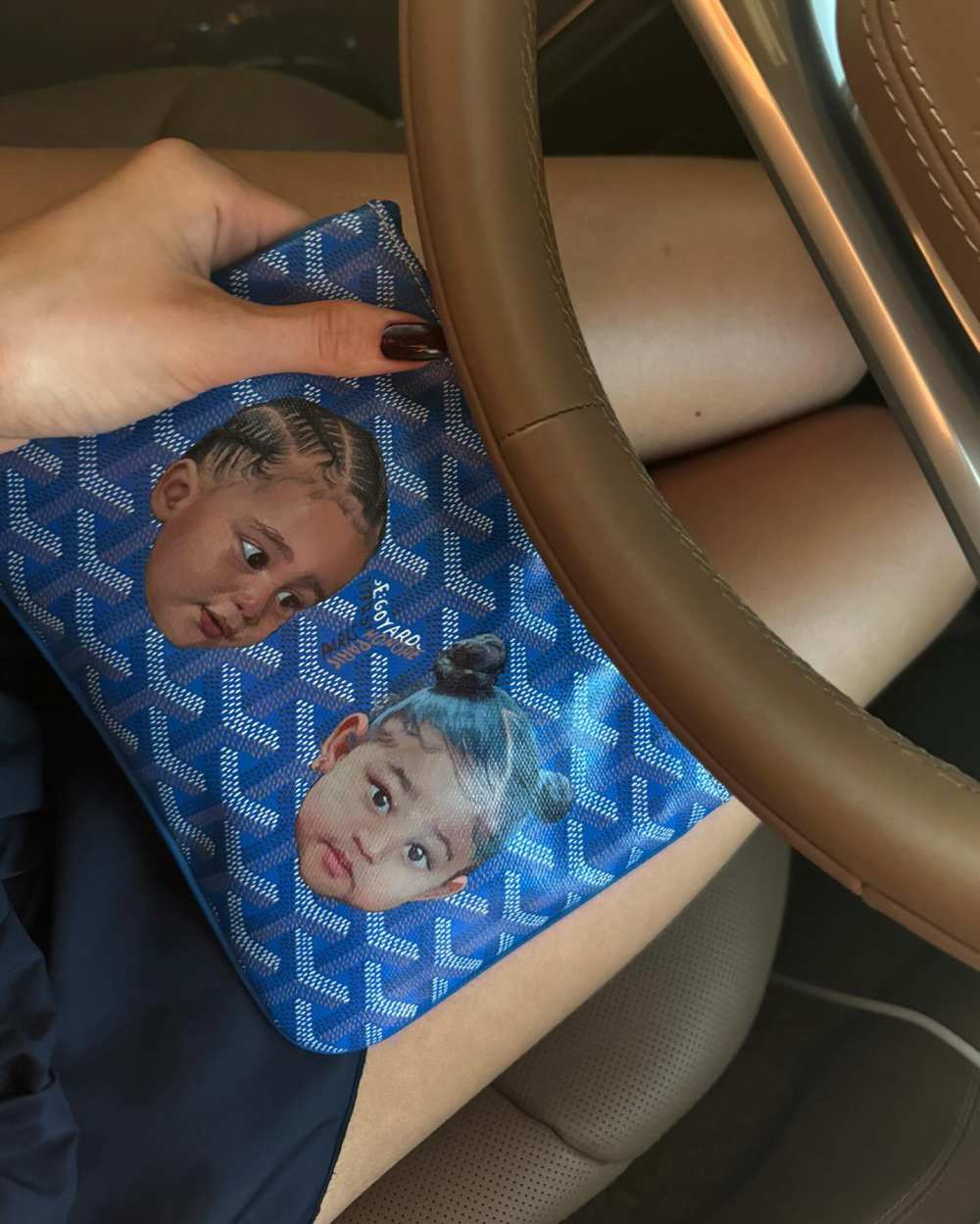 Kylie Jenner Shows Off Purse With Stormi and Aire’s Faces on It