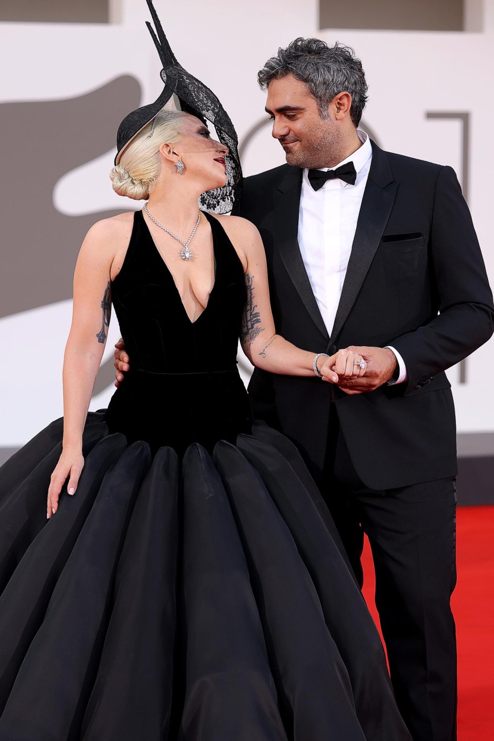 Lady Gaga and Michael Polansky attend the Joker Folie à Deux red carpet 5732