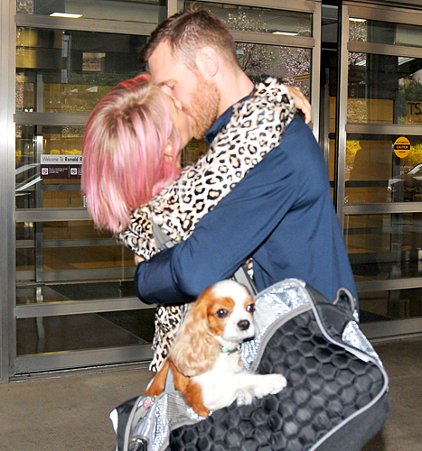 Julianne Hough and Brooks Laich kiss at airport