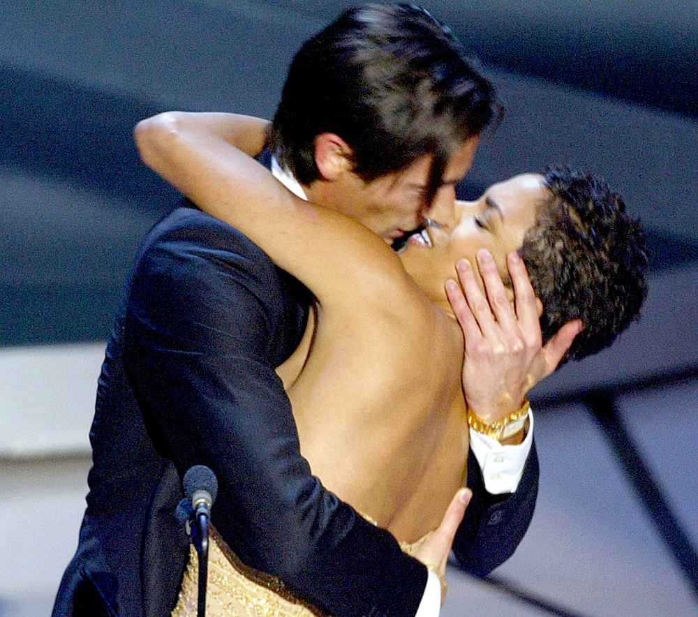Adrien Brody kisses presenter Actress Halle Berry as he accepts his Oscar for Performance by an actor in a leading role for his role in "The Pianist" during the 75th Academy Awards at the Kodak Theatre in Hollywood, California, 23 March, 2003.