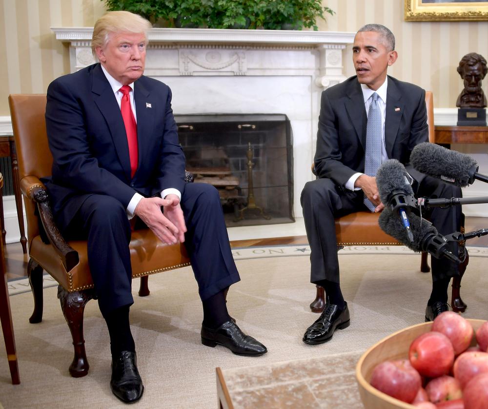 US President Barack Obama meets with President-elect Donald Trump on transition planning in the Oval Office at the White House on November 10, 2016 in Washington,DC.