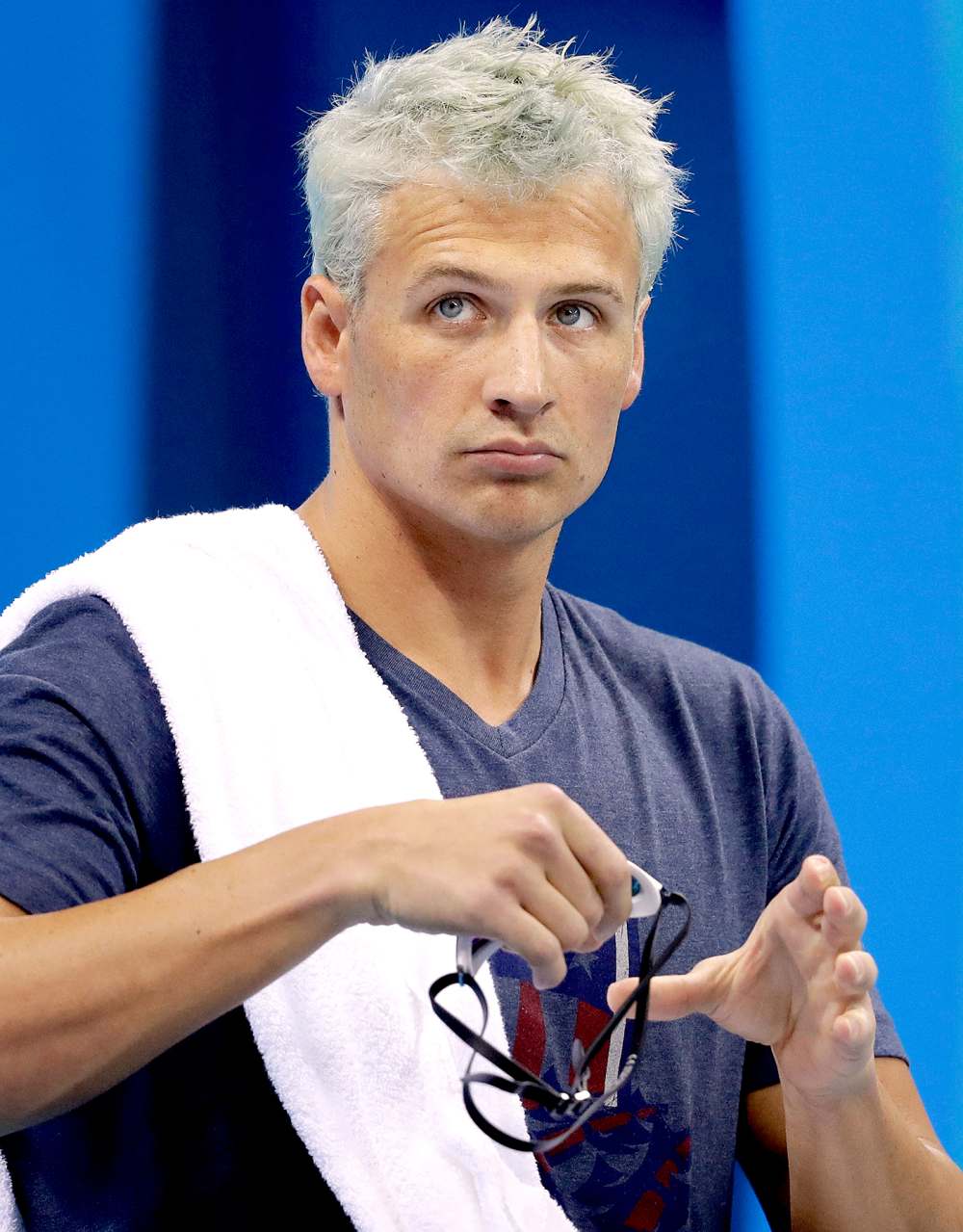 Ryan Lochte prepares before a men’s 4 x 200–meter freestyle heat during the swimming competition at the 2016 Summer Olympics, Tuesday, Aug. 9, 2016.